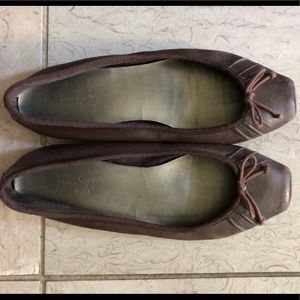 Dark brown leather flats with bow